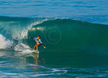 Malia Manuel setting up on a big wave