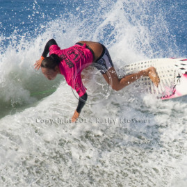 Melanie Bartels makes a cut back on a wave