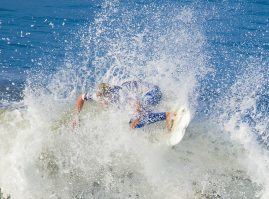 Coco Ho in the white water at the US Open Surf Contest
