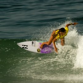 Tanika Hoffman surfing in the 2016 Supergirl Pro in Oceanside, CA
