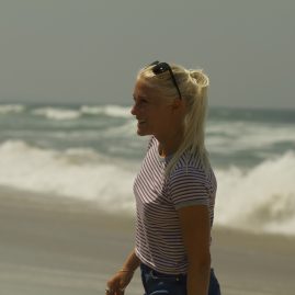 Tatiana Weston-Webb smiling at the beach