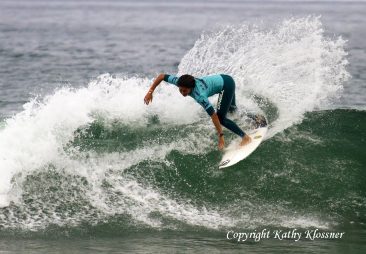 Malia Manuel surfing in Huntington Beach, CA