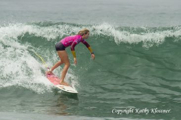 Bianca Buitendag dropping down in a wave at a surf contest
