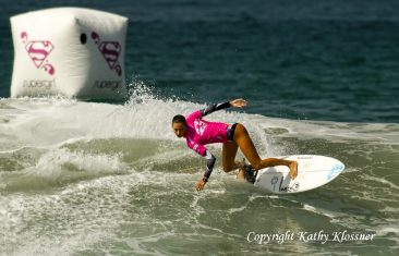 Chelsea Tuach surfing a the Supergirl Pro in Oceanside, CA
