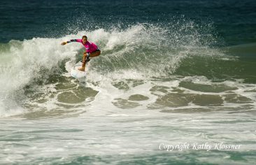 Chelsea Tuach surfing in a contest