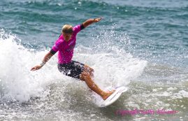 Paige Hareb surfing at the Supergirl Pro in Oceanside, CA