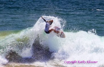 Paige Hareb flies off a wave