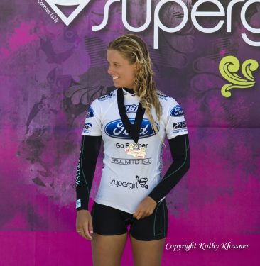 Paige Hareb standing with her surf medal on her neck