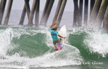 Paige Hareb going verticle on a wave