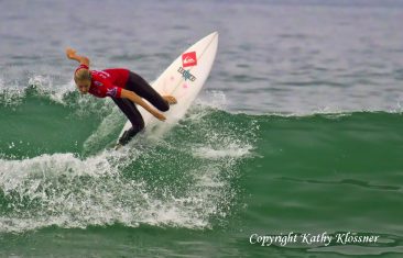 Stephanie Gilmore surfing in a contest