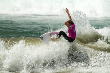Coco Ho doing an off-the-lip at the Supergirl Pro.