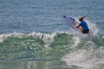 Lakey Peterson rockets off a wave