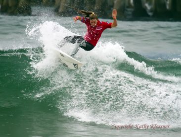 Coco Ho showing a surf move.
