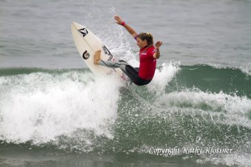 Coco Ho doing an off the lip on a wave.