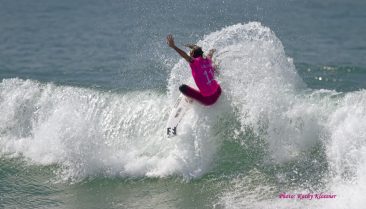 Courtney Conlogue dropping off a wave.