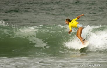 Makayla Moss surfing in the Grom 11-14 surf contests