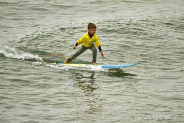 Young boy surfing style