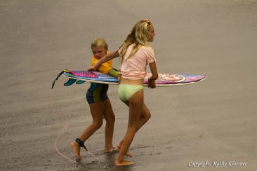Surf Sisters helping each other