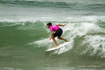 Silvana Lima charging a large wave in California.