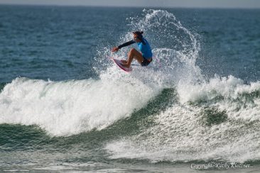 Carissa Moore hops off a wave at Trestles, CA.