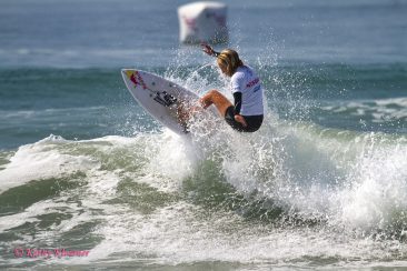 Caitlin Simmers surfing in CA.